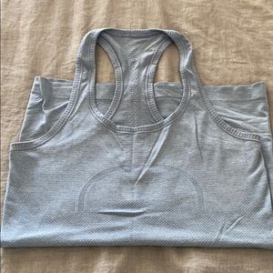 Like new. Lululemon swiftly tech racerback.